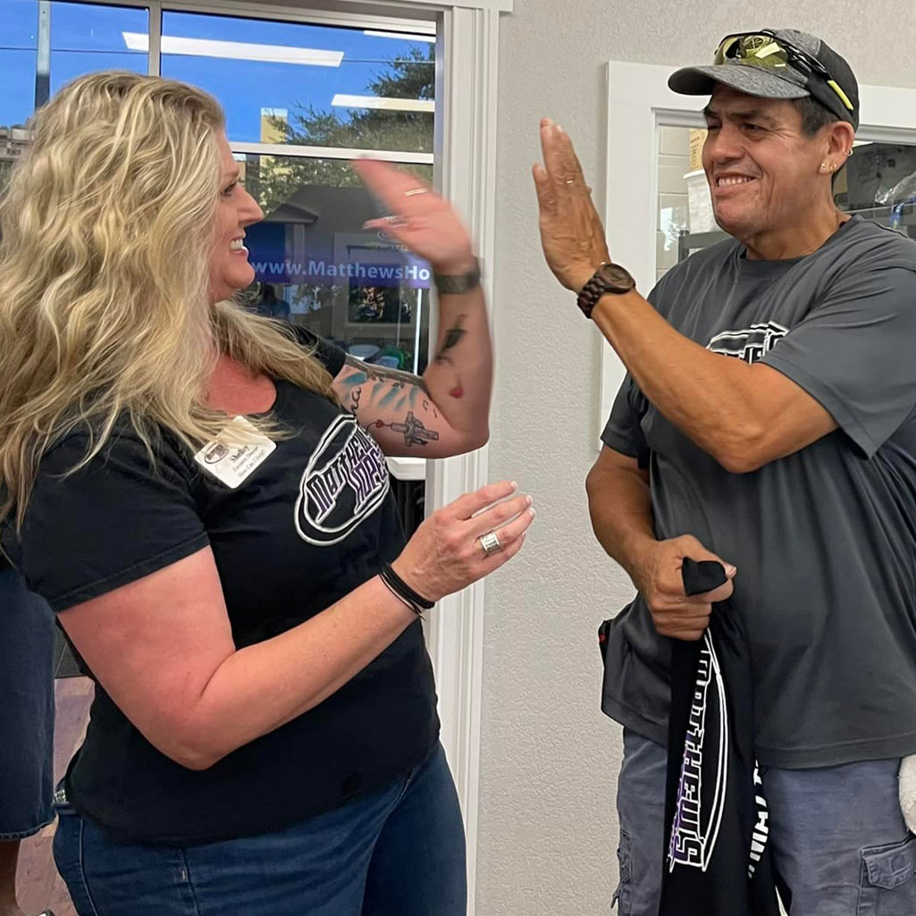 Miguel-and-Shelley-Bradford-high-five