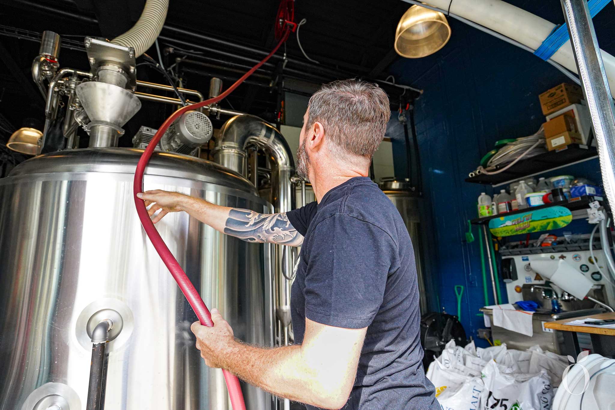 Head Brewer, Aaron Anderson, prepares to clean out one of the tanks at Windermere Brewing Company